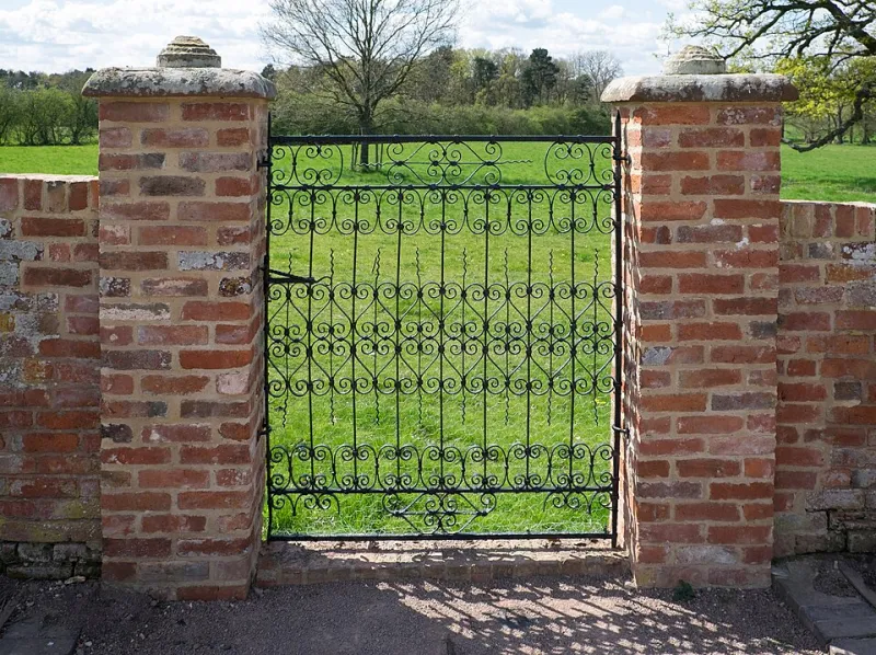 When the Vines Move In: Why a Forged Trellis Is the Sculpture Your Garden Is Missing